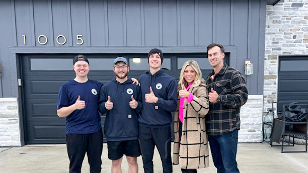 Blue Cow Moving crew thumbs up